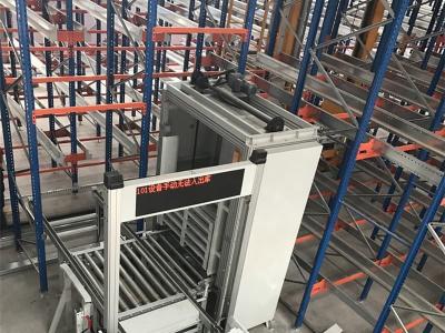 Shuttle and stacker crane